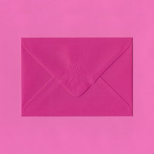 Load image into Gallery viewer, A bright pink envelope, the flap embossed with the Elizabeth May Designs logo, on a pink background
