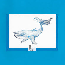 Load image into Gallery viewer, A detailed colour illustration on a luxury greeting card of a blue coloured whale, with a kingfisher blue envelope held together with an eco friendly plastic free card catch sticker, sitting on a blue background
